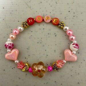 Hope bracelet in pink and gold